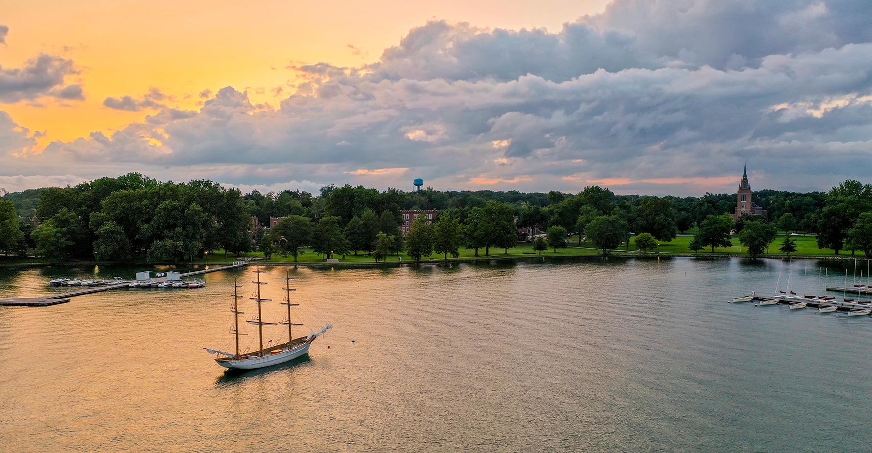 sunset, boat on water